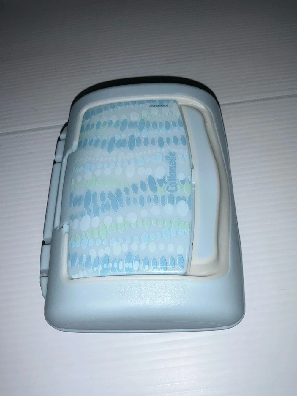 Cottonelle Mostly Colored Blue w/ Green with Word Logo Print Top Pop-Up Dispense